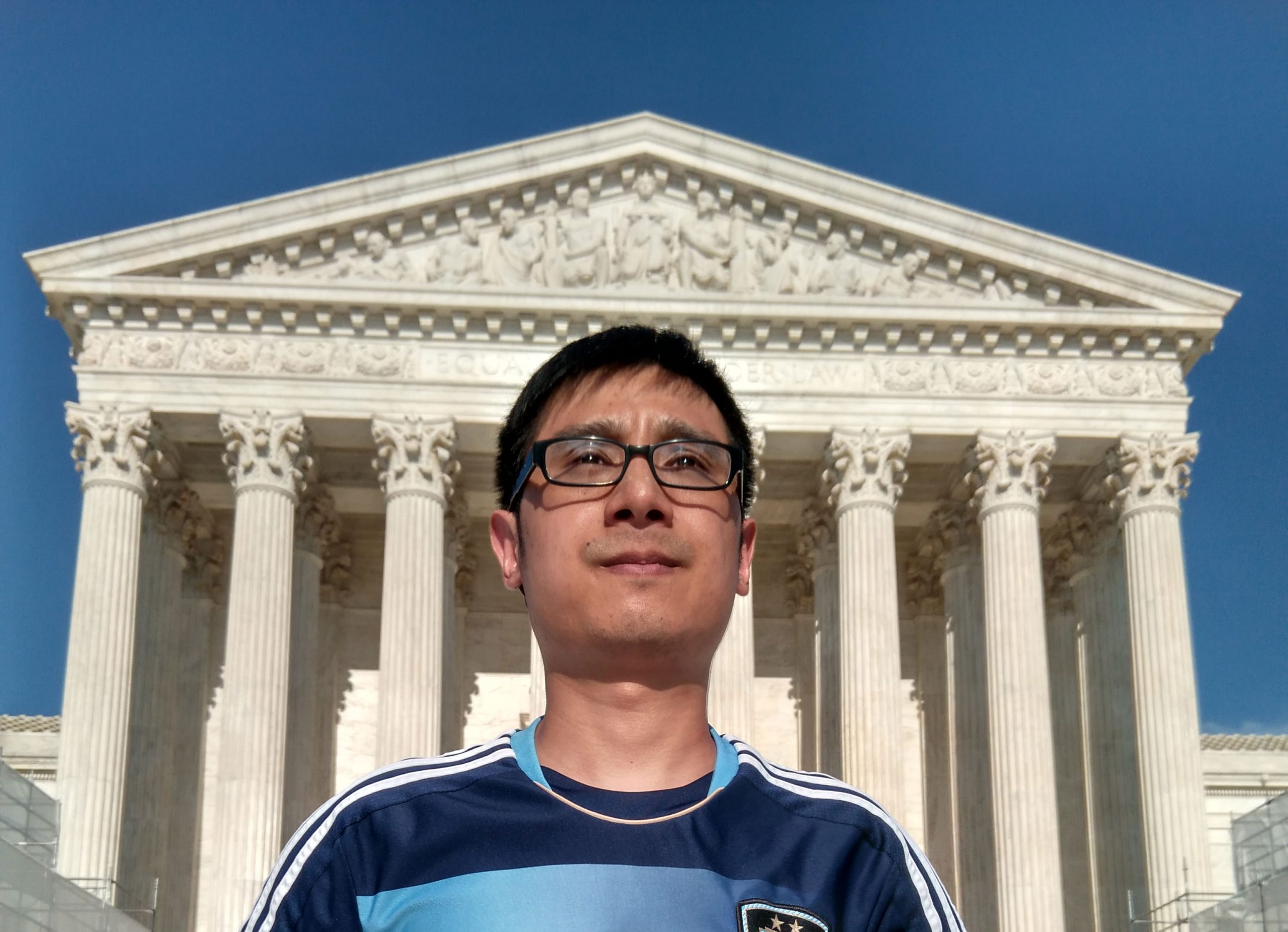 Jun in front of Supreme Court building